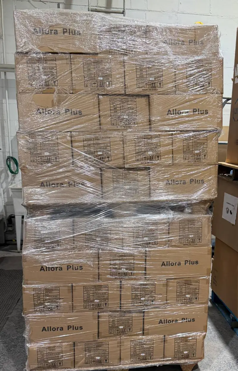 Pallet of boxes wrapped in plastic in our Montréal warehouse